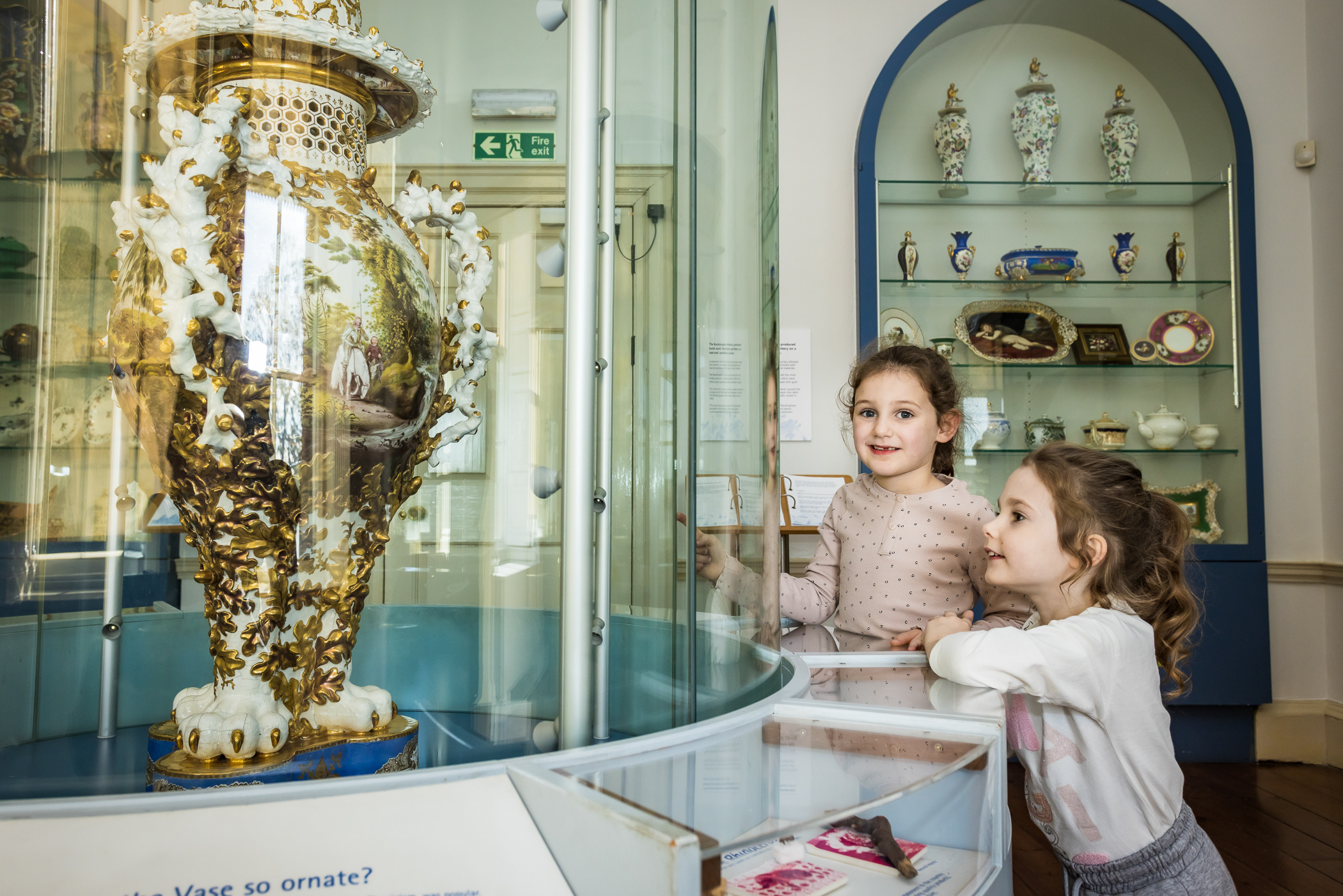 Children looking at ceramics in the museum