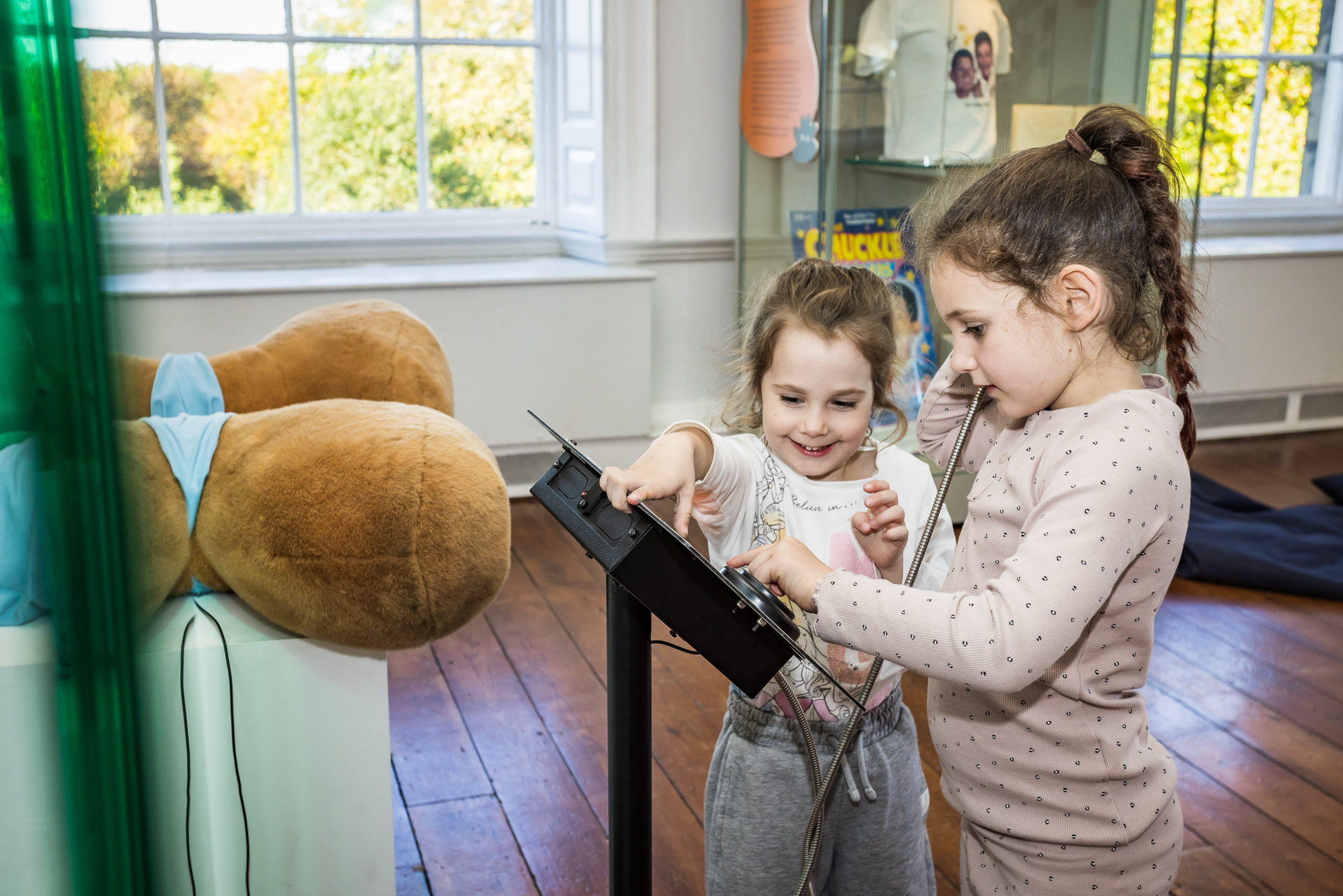 Children interacting with museum exhibits