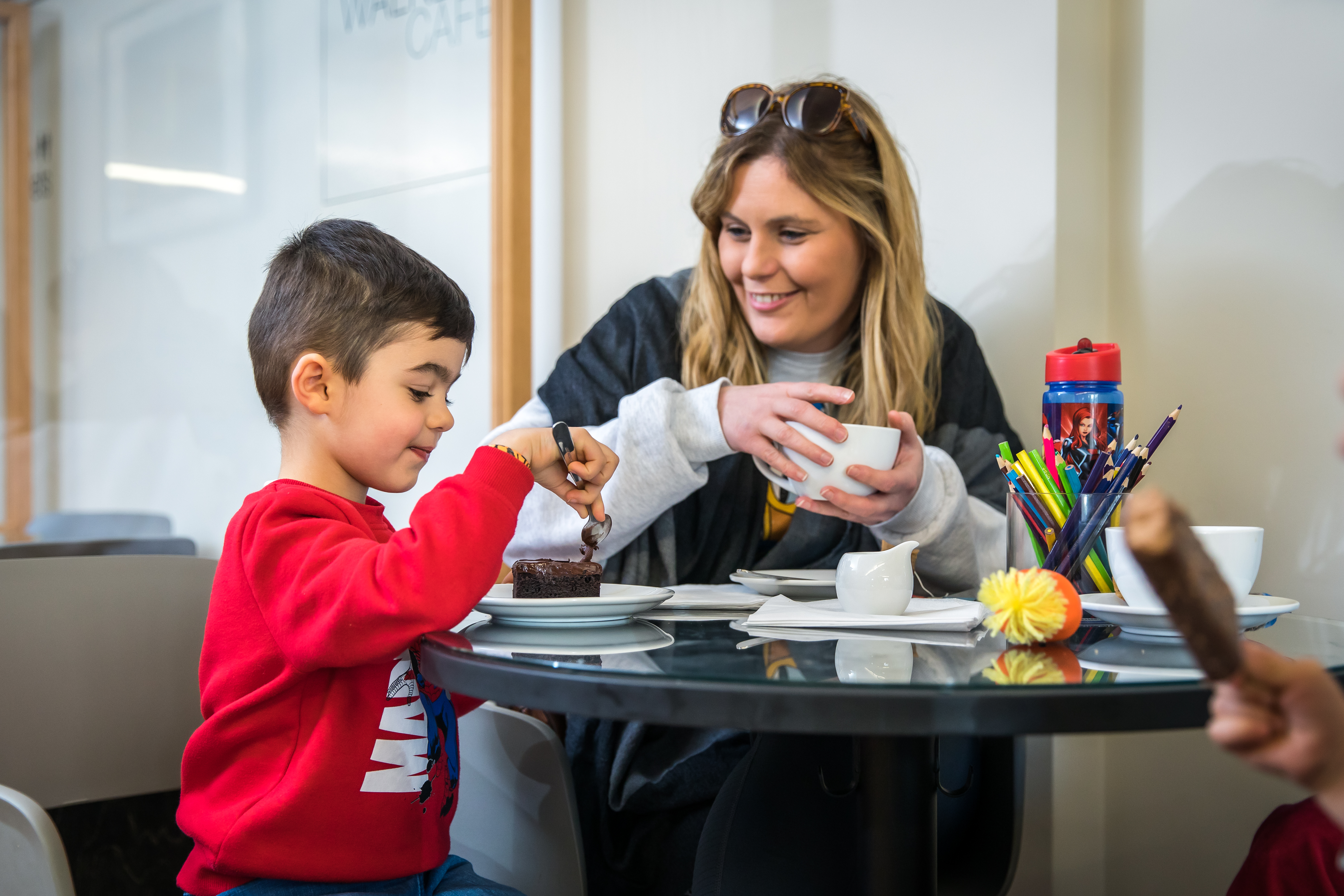 Family sat inside walker cafe