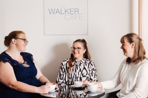 Group of women enjoying hot drinks