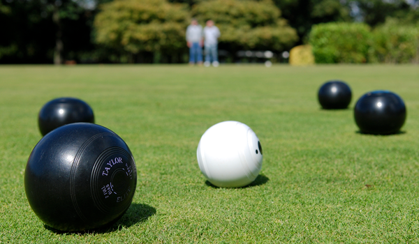 Close up of bowling balls on the green